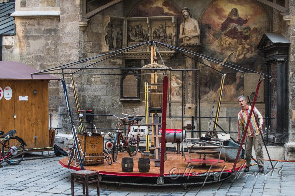 building up a merry-go-around made of recycling parts