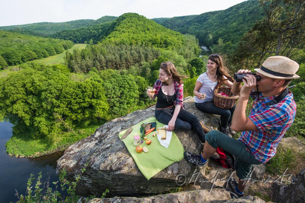 hikers resting on the peak of the mountain 