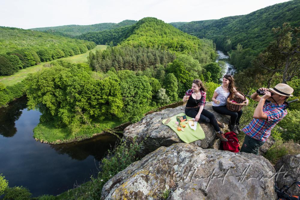 hikers resting on the peak of the mountain 
