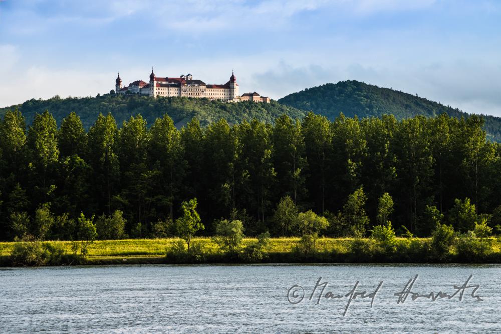Monastery Goettweig on the hill and rivershore