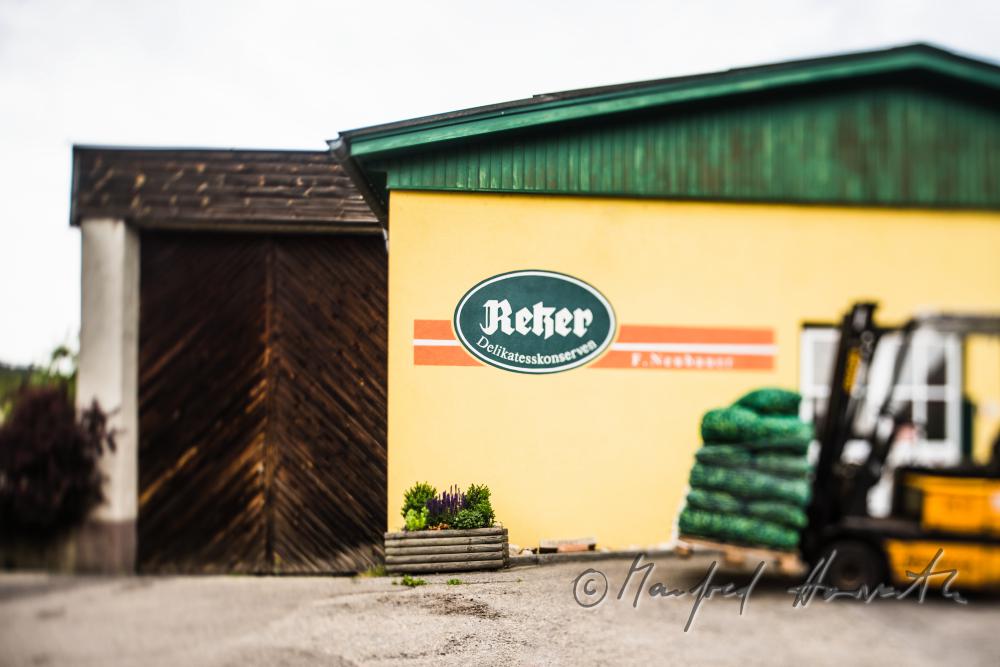 forklift with a sack of cucumbers in front of the preserving plant