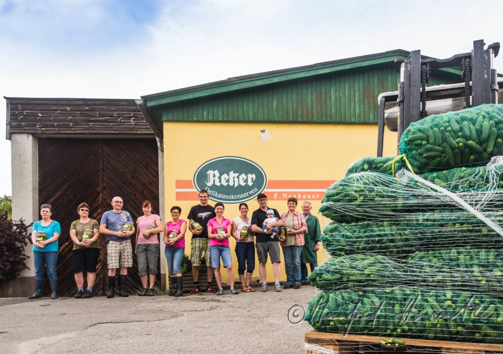 staff and Neubauer family (operators) in front of the preserving plant