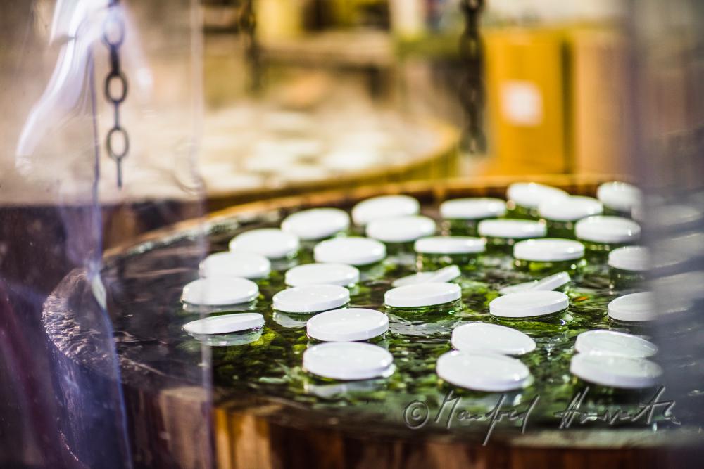 pasteurizing of cucumbers in a big wooden vat