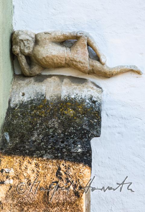 sculpture on the fassade of a heritage-protected house