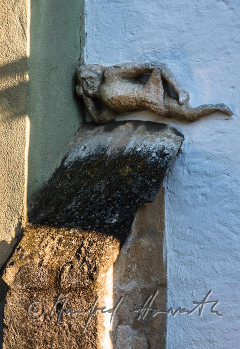 sculpture on the fassade of a heritage-protected house