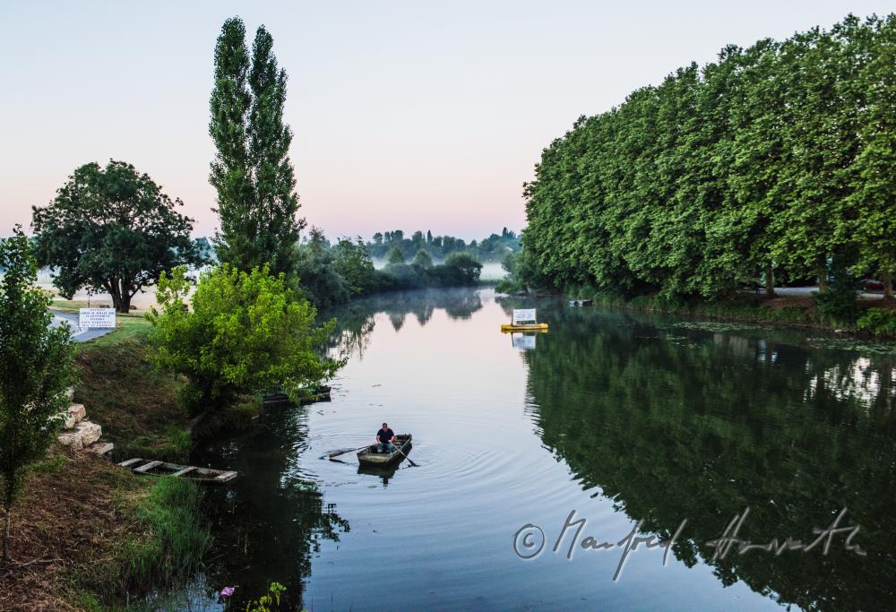 fisherman in the harbour of the river La Seille