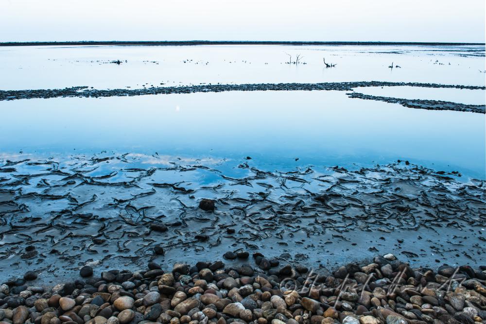 dry salt pond in the alluvial plain