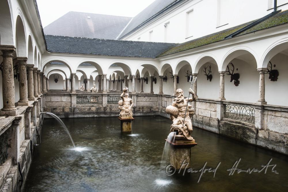 baroque statue of Neptun at the fish tank