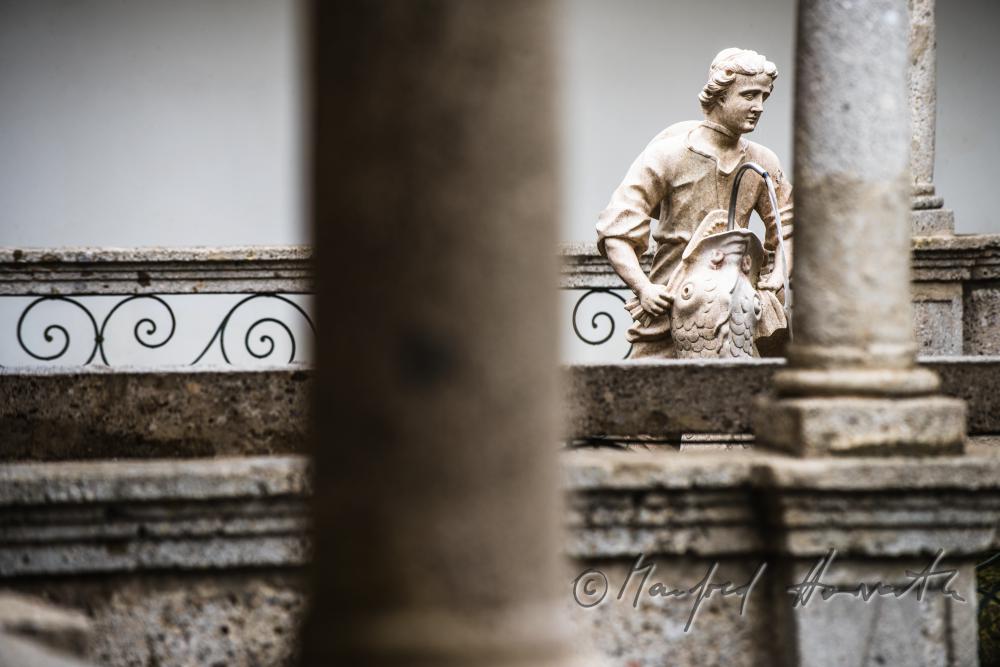 baroque statue of David at the fish tank