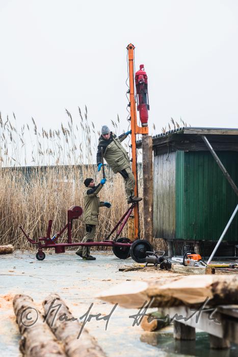 workers battering of pickets for a pontoon