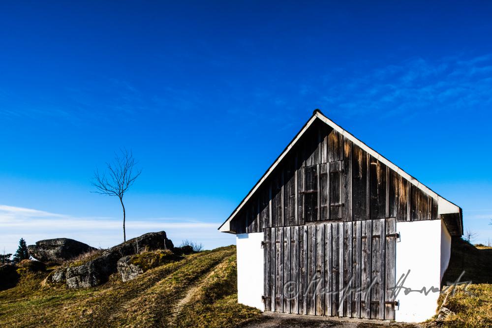granite boulders and barn