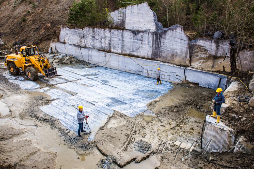 stonemason works in the marble quarry